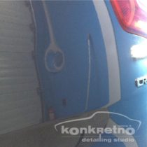 Вмятина на заднем крыле авто